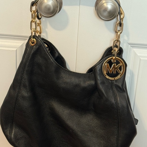 Michael Kors Black Hobo Bag with Gold Accents - Picture 9 of 14